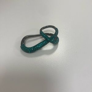 RESERVED….Swarovski double ring Tigris collection.  Jlo would love it!